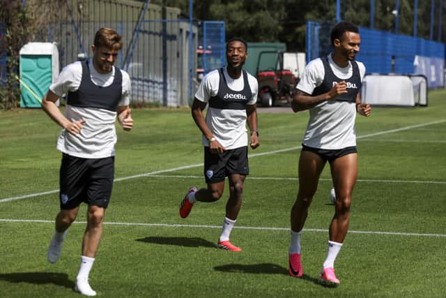 Josh Murphy (far right) has handed Pompey an injury boost. Also pictured are Zak Swanson (left) and Ebou Adams, Picture: Habibur Rahman