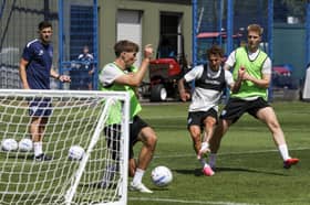 From left to right: John Mousinho, Hayden Matthews, Adrian Segecic and Josh Knight at Pompey's training ground today. Pic: Habibur Rahman