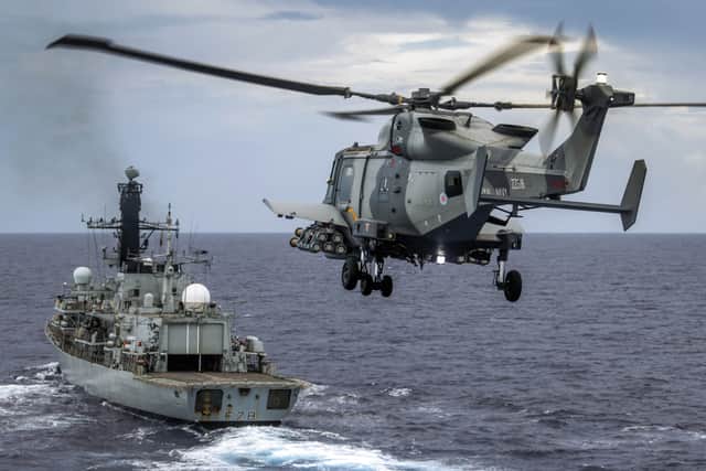 Two Type 23 frigates are due to be retired imminently, with Wildcat helicopters due be replaced by drones. Pictured: A Wildcat HMA Mk 2 helicopter flying alongside Type 23 frigate HMS Kent.
