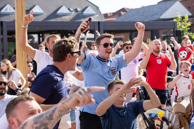 England fans at The Green Posts in Hilsea celebrating the Three Lions' 2-1 victory over DR Congo.