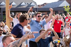 England fans at The Green Posts in Hilsea celebrating the Three Lions' 2-1 victory over DR Congo.