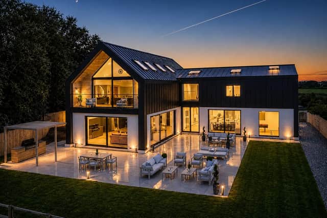 The five-bedroom Woodplumpton home sits in 1.77 acres and comes with all furniture, fixtures and fittings included