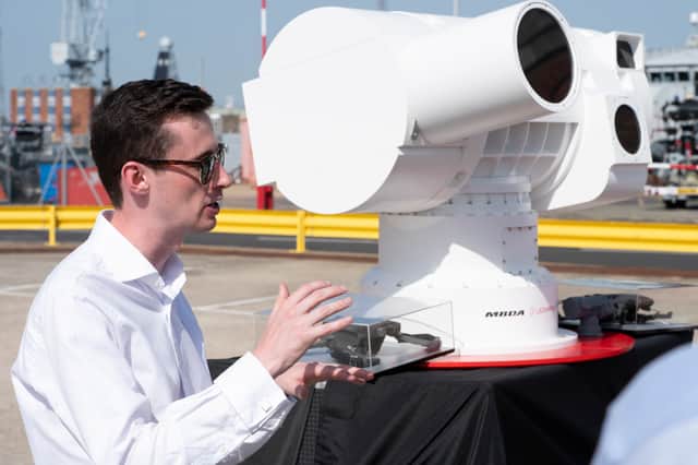 Oliver Mead, MBDA’s UK Business Manager for Laser Directed Energy Weapons, discussing the DragonFire laser weapon at HMNB Portsmouth.