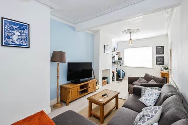A bright and versatile lounge flowing through an open plan layout ideal for relaxing and entertaining