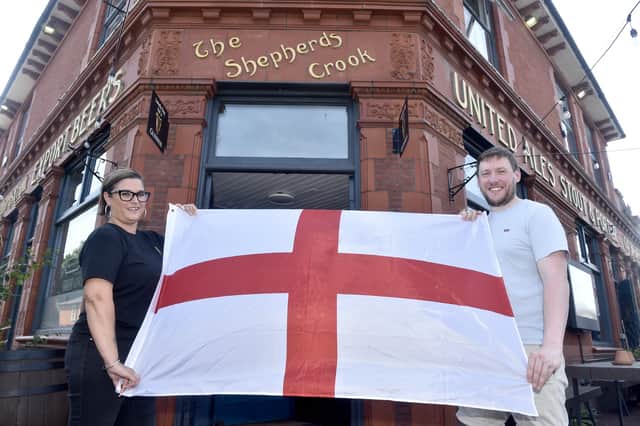 Nick Lee, landlord of the Shepherd's Crook in Fratton, right, and Lindsay Waters, supervisor.