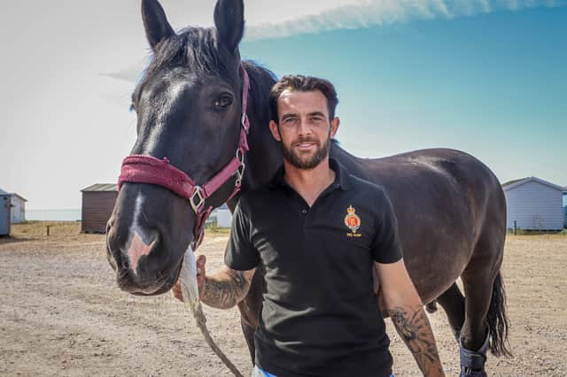Pictured: Lance Corporal James Fisher, of Landport in Portsmouth, serves in the Household Mounted Cavalry Regiment. He's pictured alongside Vesuvius.