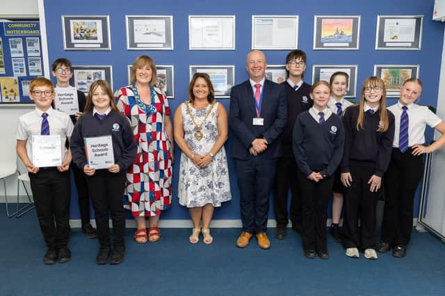 Bridgemary School gets heritage schools award Pictured: Gosport Mayor Kirsten Bradley with headteacher Tom Garfield and children from the Bridgemary School 
Picture:Marcin Jedrysiak