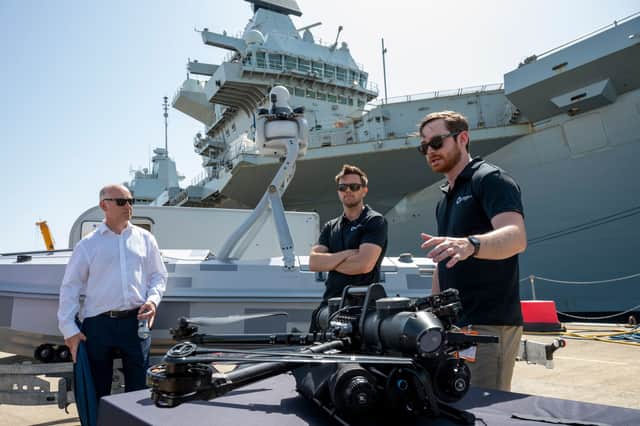 Royal Navy personnel showcasing the latest technology during a Nato Plenary at HMNB Portsmouth. Pictured: SubSea Craft MARS (USV)  in the background and CADDIS (UAV) in the foreground.