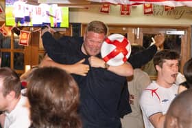 England fans celebrate victory over Mexico at the World Cup