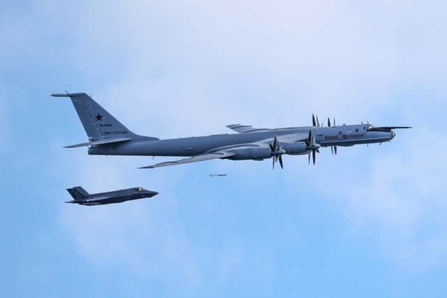 An F-35B fighter launched from HMS Prince of Wales intercept a Russian Tupolev Tu-142 maritime reconnaissance and anti-submarine warfare (ASW) aircraft, NATO name 'Bear', which deployed a Sonobuoy by parachute.