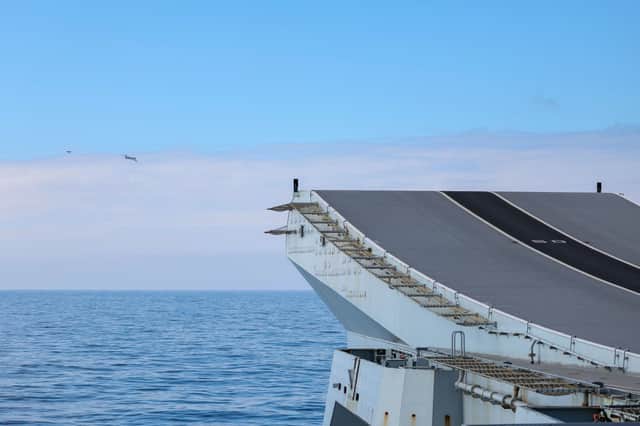 An F-35B fighter launched from HMS Prince of Wales intercept a Russian Tupolev Tu-142 maritime reconnaissance and anti-submarine warfare (ASW) aircraft, NATO name 'Bear'.