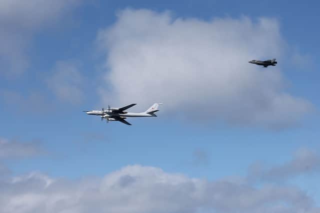An F-35B fighter jet launched from HMS Prince of Wales intercept a Russian Tupolev Tu-142 maritime reconnaissance and anti-submarine warfare (ASW) aircraft, NATO name 'Bear'.