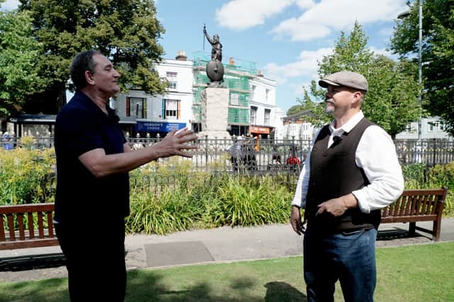 Author and historical researcher Graham Phillips, left, with Weird Britain presenter Andy Mcgrath at the King Alfred statue in Winchester