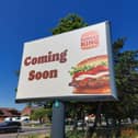 Signs have appeared for the new Burger King in Gosport.