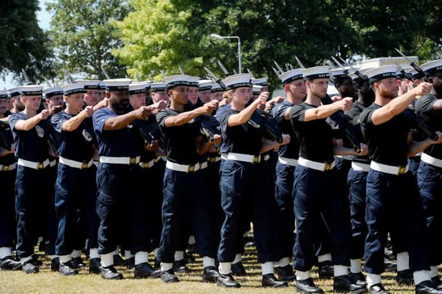 Royal Navy Ceremonial Guard marching as one during the Beating Retreat rehearsals at HMS Excellent on Whale Island.