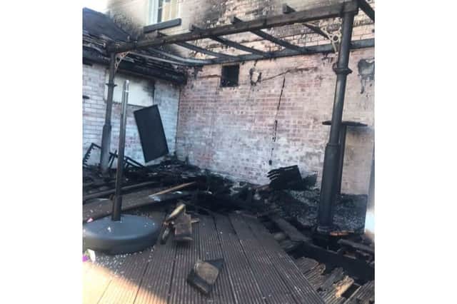 The fire at The Bridge Tavern in Old Portsmouth was kept to the decking area.