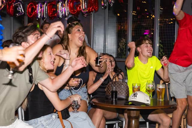 The crowd erupted with delight as Jude Bellingham fired home England’s second goal.