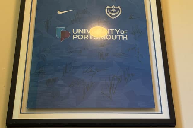 Pompey's shirt signed by the 2018-2019 squad on their previous visit to Fota Island.