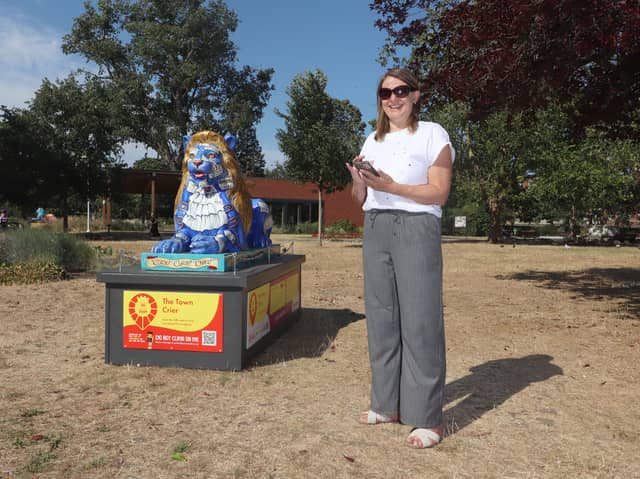 The News' Editor Kelly Brown  next to The Town Crier lion at Victoria Park,  Portsmouth
Picture: Habibur Rahman