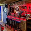 Paul and Melanie Brimecome’s The Pampered Chicken, in Emsworth is a pub-sport player's paradise, which measures 9.6m x 4.8m, boasts a pool table, a huge darts wall as well as retro arcade games and a fruit machine