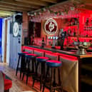Paul and Melanie Brimecome’s The Pampered Chicken, in Emsworth is a pub-sport player's paradise, which measures 9.6m x 4.8m, boasts a pool table, a huge darts wall as well as retro arcade games and a fruit machine