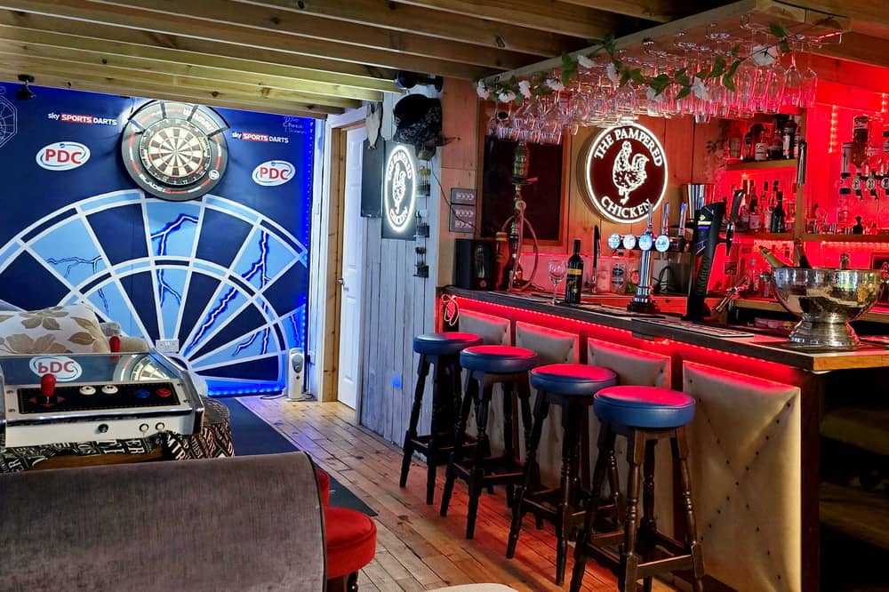 Paul and Melanie Brimecome’s The Pampered Chicken, in Emsworth is a pub-sport player's paradise, which measures 9.6m x 4.8m, boasts a pool table, a huge darts wall as well as retro arcade games and a fruit machine