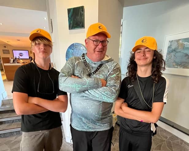 Youngsters in the Angling Mentors scheme learn how to fish - and get these hats for their efforts.