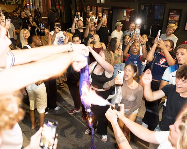 England fans set fire to an Argentina shirt in Portsmouth after the team's World Cup defeat
Picture:Marcin Jedrysiak