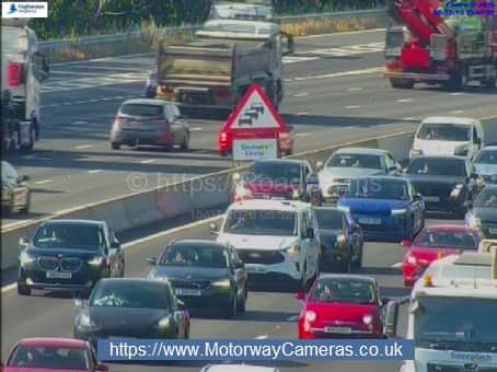 Queues of traffic on the M27 near Hedge End in Hampshire after a collision between a motorcycle and a car on July 15, 2026