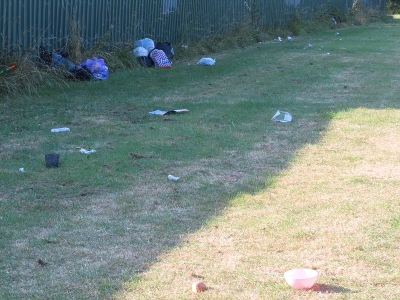 Rubbish littered on Barton Field following the traveller encampment.
