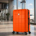 The bright orange ATX suitcase is designed to stand out on the baggage carousel while offering 110 litres of storage space.