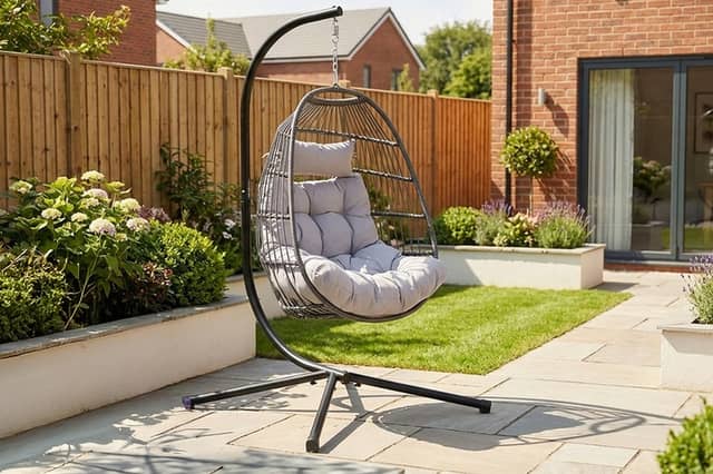 The dark grey hanging egg chair stands 202cm tall and comes with removable washable cushions
