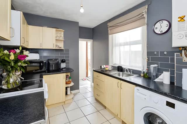 The kitchen forms a practical part of the ground floor layout, linking easily with the home's reception rooms.
