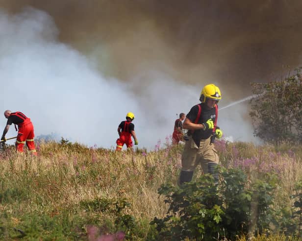 Fire crews on the Isle of Wight tackling the fire in Headon Warren