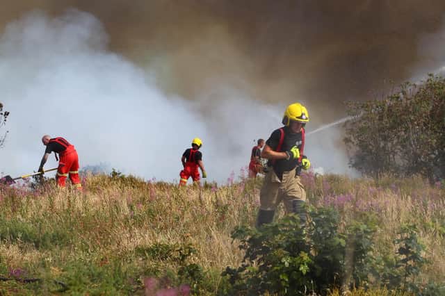 Fire crews on the Isle of Wight tackling the fire in Headon Warren