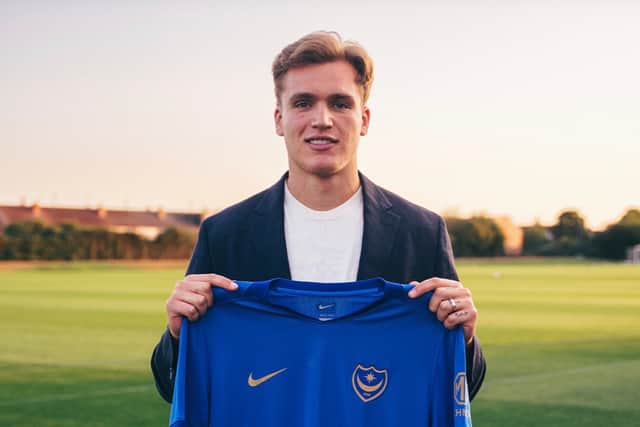 Pompey have signed striker Marko Milovanovic