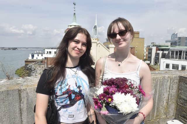 Pictured is: (l-r) Lia Sandell from Fratton, waiting for her partner AB Alex Dyke, alongside Edith Millson from Gosport, who is excited to see her boyfriend AB Dan Sudworth. Both aboard HMS Duncan, a Type 45 destroyer which returned to Portsmouth.