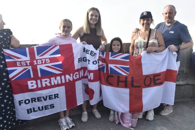 From L: Emilie Smith, Kirsty Jones, Elena Smith, Lillian Jones and Jason Jones, waiting for Medical Assistant Chloe Jones (26) and her boyfriend AB Harry Pyatt aboard HMS Prince of Wales. They travelled from Nuneaton.