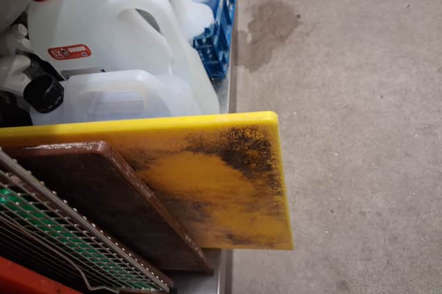 Dirty chopping boards and equipment at Copnor Takeaway.