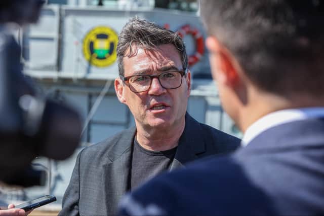 New prime minister Andy Burnham with Ukrainian minehunter Melitopol in the background.