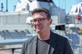 New prime minister Andy Burnham at HMNB Portsmouth on July 27. He spoke with pride about the ship's company aboard HMS Prince of Wales, who recently completed phase one of Operation FIrecrest. Pictured: Mr Burnham with the Ukrainian minehunter Melitopol in the background.
