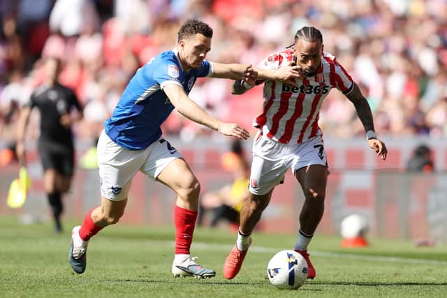 Sorba Thomas up against Pompey's Jordan Williams.