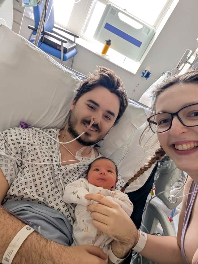Sam King with his wife and daughter in hospital