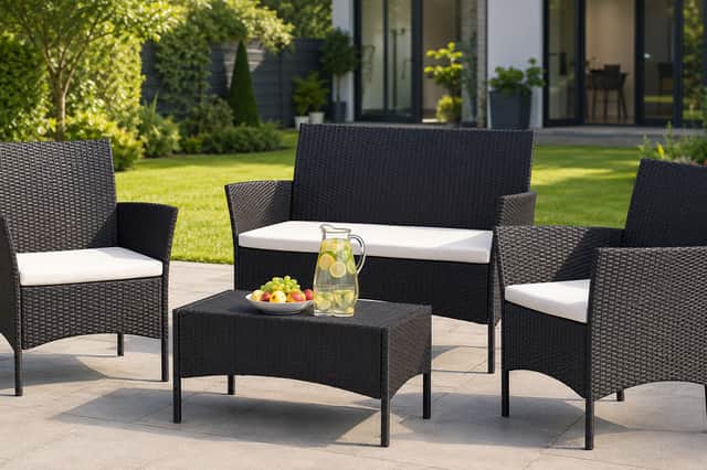 The compact four-seater rattan garden furniture set is available for £54.99 in a choice of black or mixed grey.