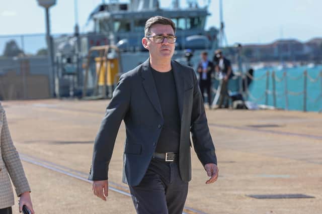 New prime minister Andy Burnham promises to reindustrialise the defence sector in Portsmouth, adding that the sector will see more support. Pictured: Mr Burnham at HMNB Portsmouth.