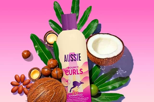 The Aussie Bouncy Curls Bundle includes a shampoo, deep conditioner and leave-in curl cream for defined, hydrated curls.