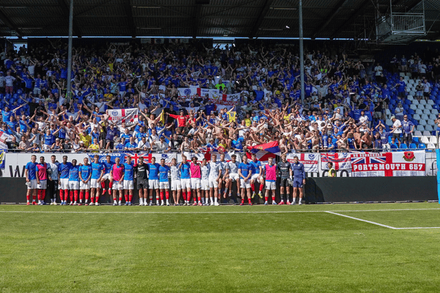 Pompey players and fans come together following the goalless draw at SV Darmstadt. Picture: Jason Brown