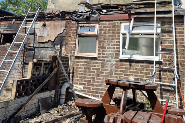 The fire started in the garden of the house on the left, spreading to their neighbour's property