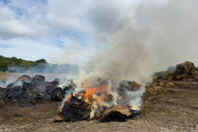 A fire on a piece of land off Titchfield Lane, Wickham, has resulted in a tractor, hay bales and a barn sustaining damage.