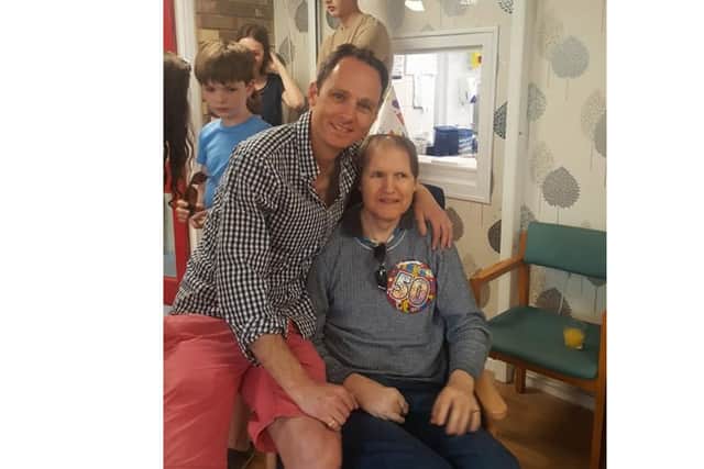 Pictured: Chris (left) with his brother Andrew.